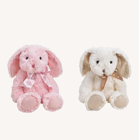 La lapin de Pâques en peluche rose ou blanc