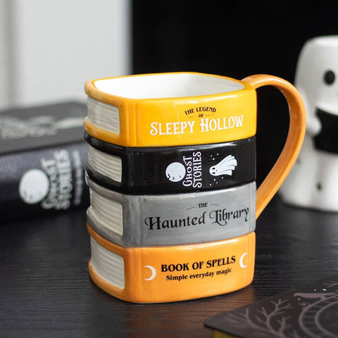 La tasse « Pile de livres de la bibliothèque hantée »