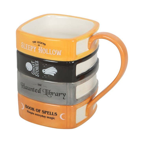La tasse « Pile de livres de la bibliothèque hantée »